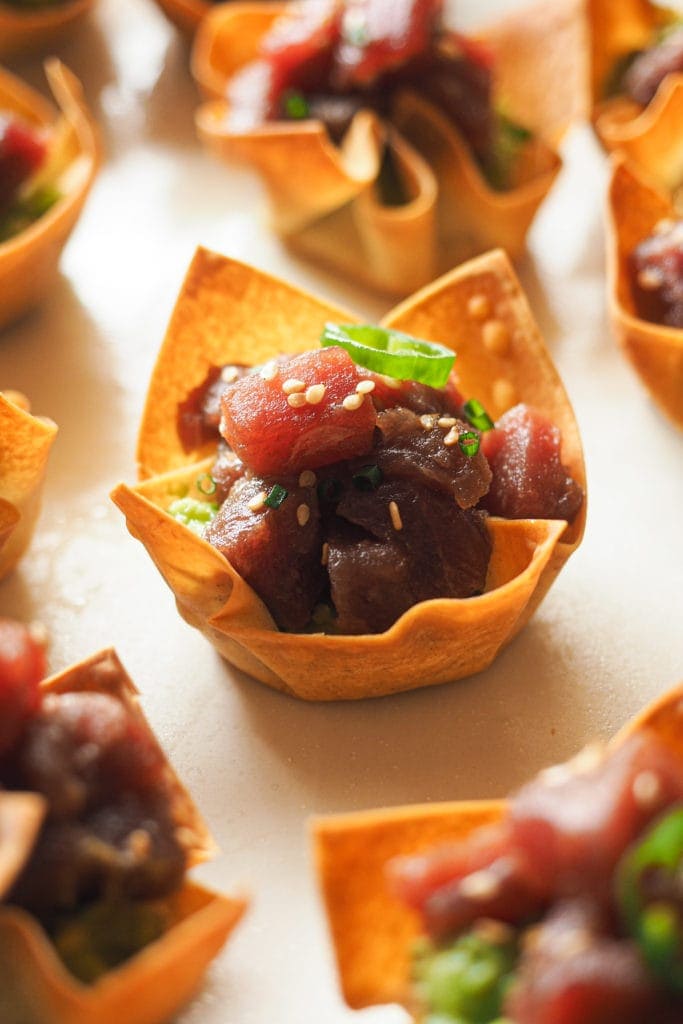 Crunchy Tuna Tartare Wonton Cups to impress your family and friends with an appetiser. They're restaurant worthy with their crunchy wonton base stuffed with an avocado mash and topped with a delicious tuna tartare. They're not only mouthwatering but also incredibly easy to make. | Paula's Apron Recipe