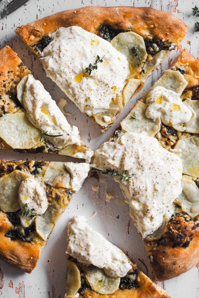 Potato Pizza with Burrata and Truffle, plus a layer of caramelised onion and cheddar. The burrata is added when you take the pizza out of the oven, and the heat that comes out from it makes it even creamier… To die for! | Paula's Apron Recipe