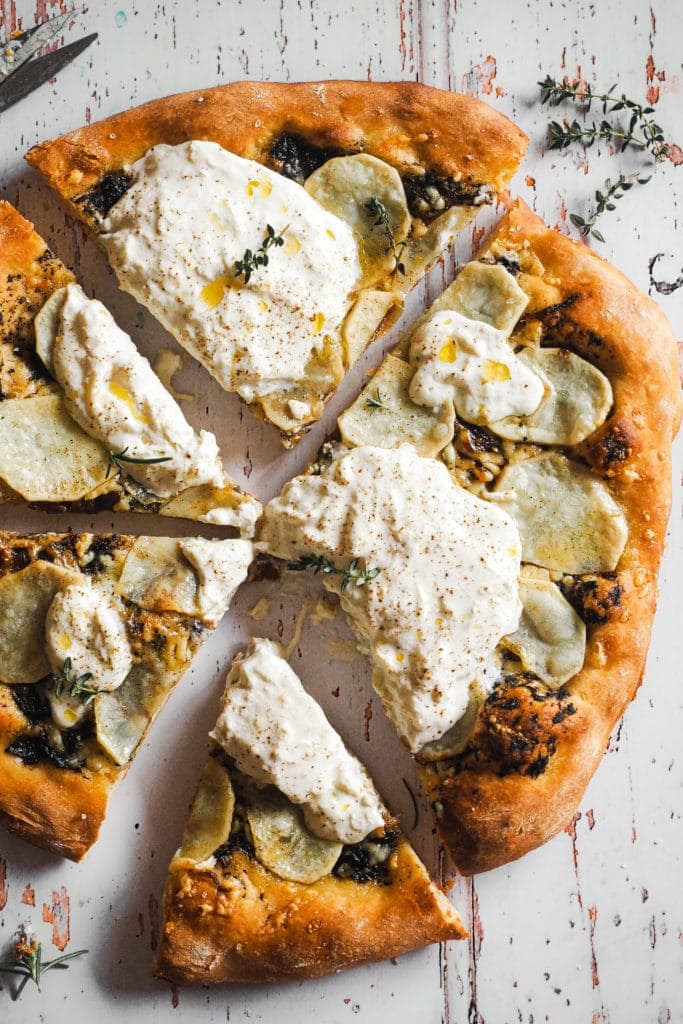 Potato Pizza with Burrata and Truffle, plus a layer of caramelised onion and cheddar. The burrata is added when you take the pizza out of the oven, and the heat that comes out from it makes it even creamier… To die for! | Paula's Apron Recipe