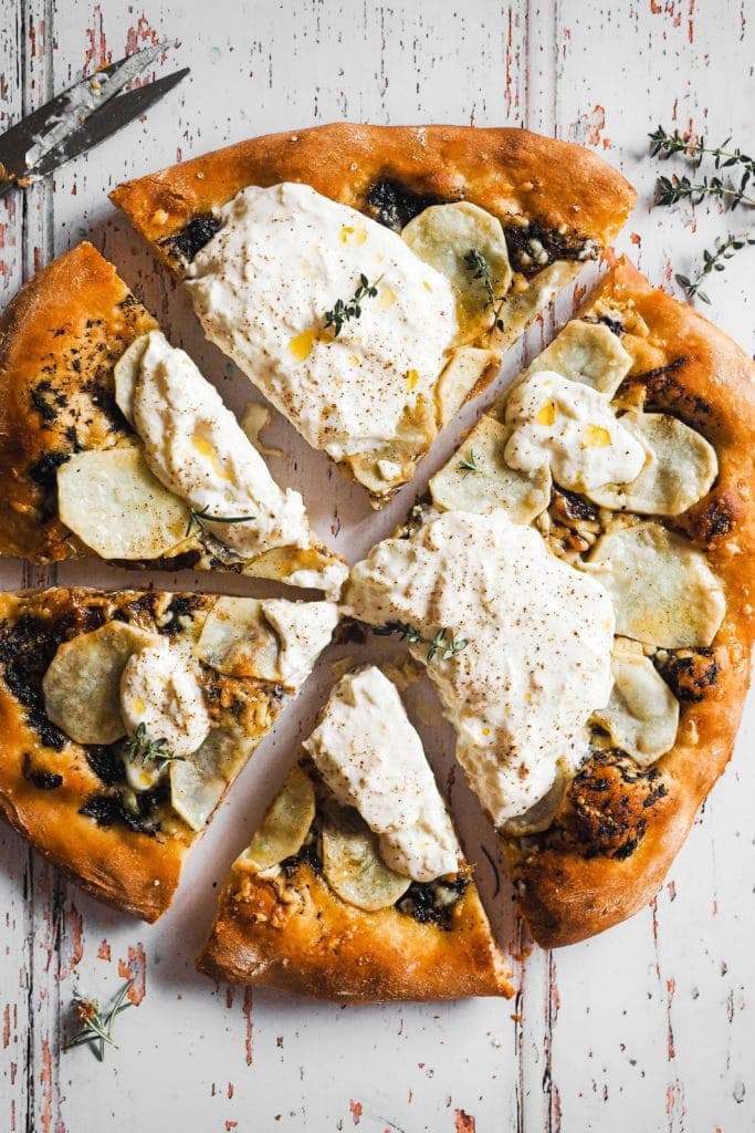 Potato Pizza with Burrata and Truffle, plus a layer of caramelised onion and cheddar. The burrata is added when you take the pizza out of the oven, and the heat that comes out from it makes it even creamier… To die for! | Paula's Apron Recipe