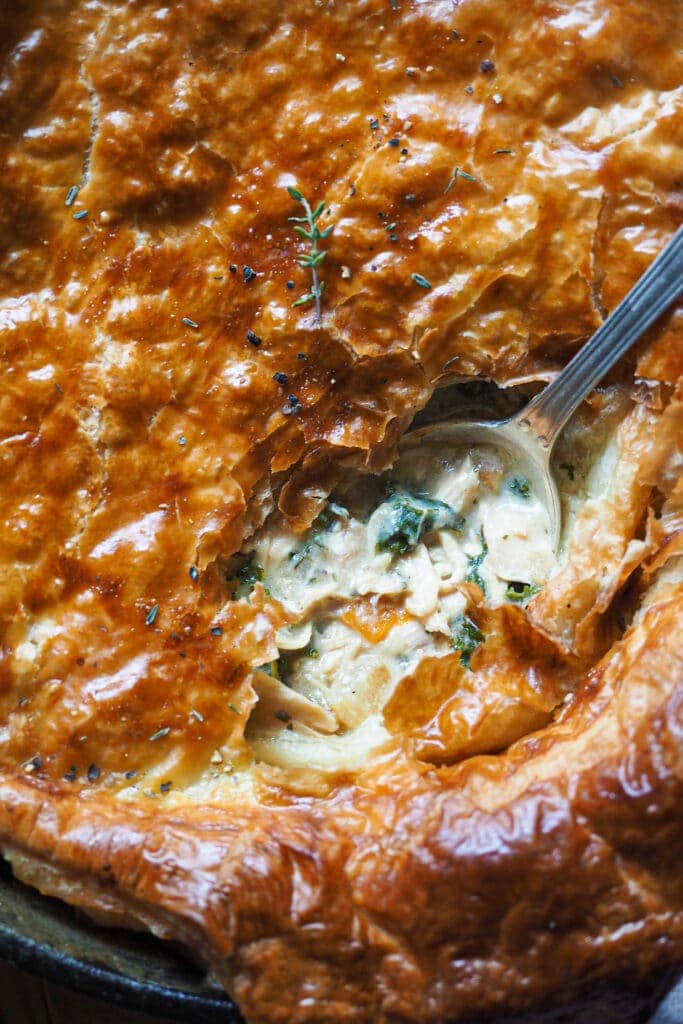 This this Easy and Nutritious Chicken Pot Pie is a comforting, flavourful and nutrient-packed dish with an indulgent touch. It has a creamy but light filling, the smell and flavour feed your soul and the crunchy puff pastry on top is perfect to kill any cravings without giving up on a super nutritious meal. You can make the filling ahead, which makes it perfect for meal prep, and it's also perfect for using rotisserie chicken or roasted turkey leftovers. | Paula's Apron Recipe