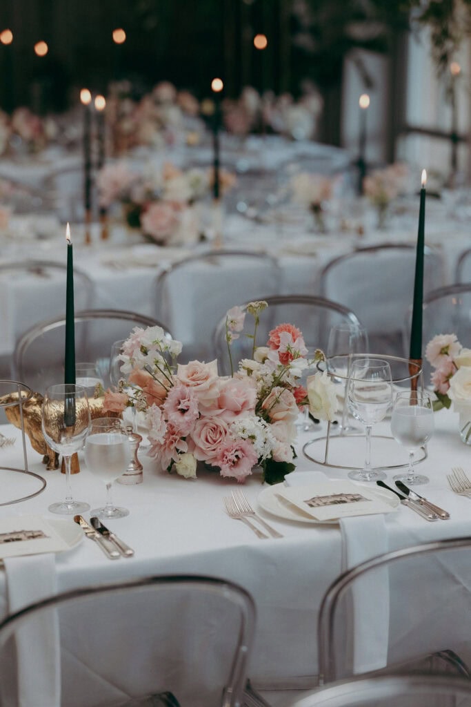 Elegant wedding table setting with pastel floral centerpiece and candles - Derbyshire wedding photographer.