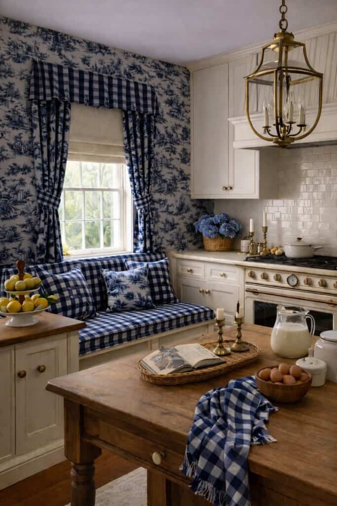 Traditionally decorated kitchen in blue and white toile and gingham