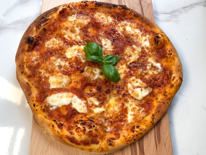 Best Homemade Pizza Recipe with fresh basil.