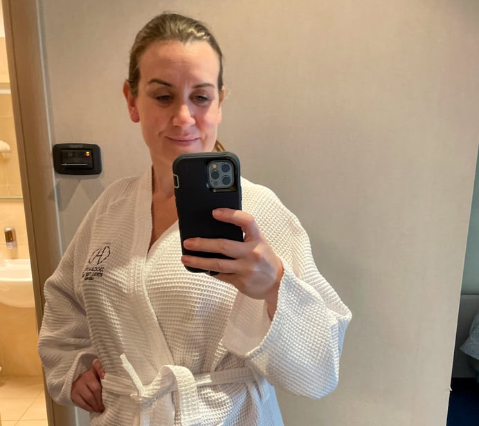 Melanie May in a robe ready for her massage