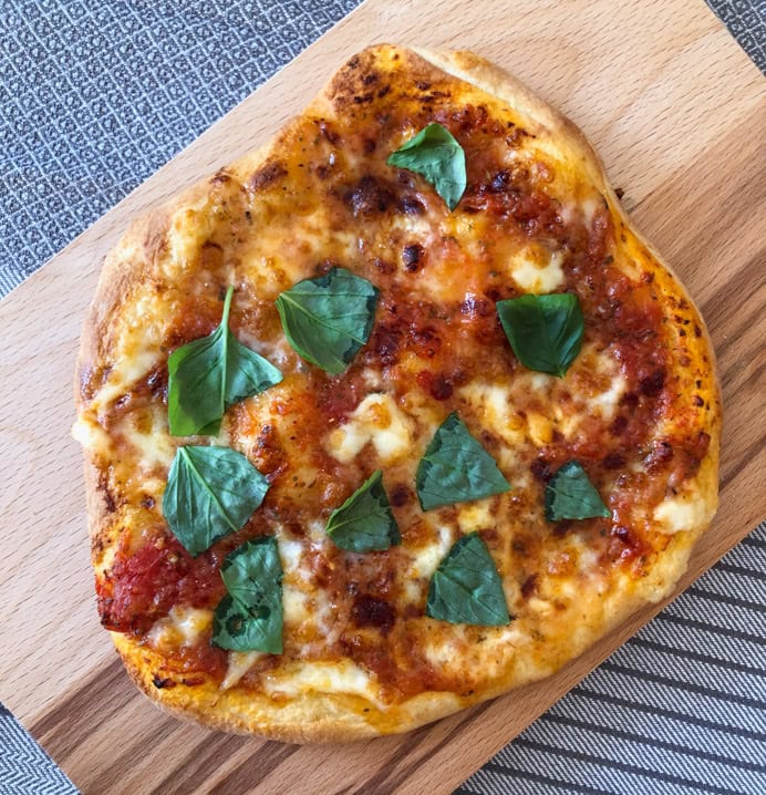 Best Homemade Pizza Recipe with fresh basil.