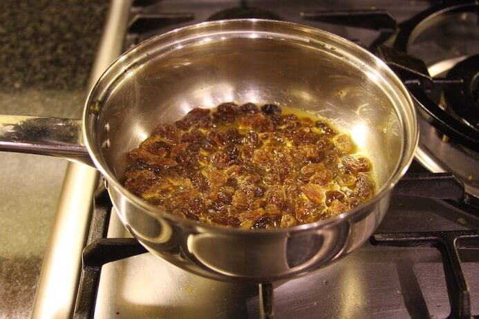 Place the sultanas in a pan with water or orange juice and heat for ten minutes