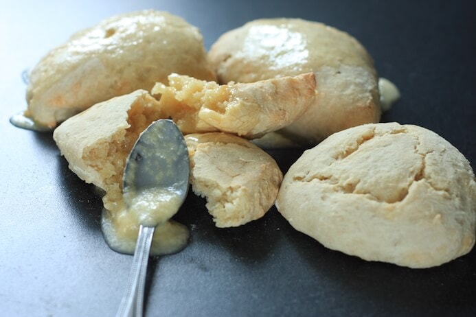 Lemon yougurt scones recipe with a spoonful of citrus glaze