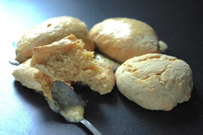 Lemon yougurt scones recipe with a spoon of citrus glaze