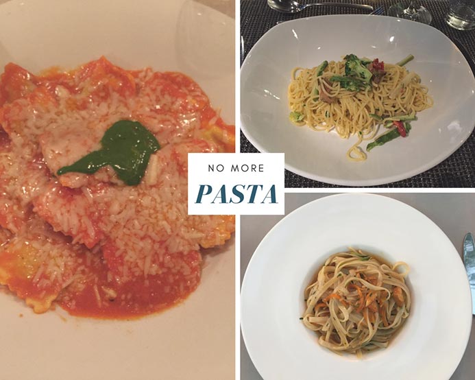 Three dishes of pasta, the default vegetarian option at most restaurants.