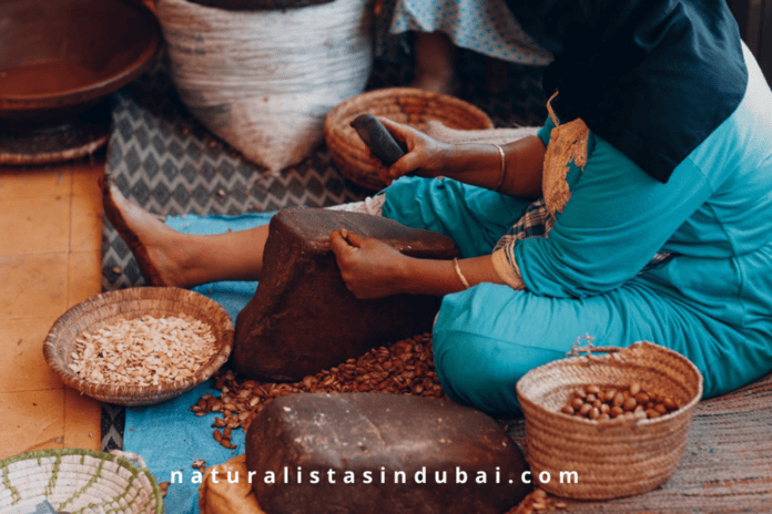 Local woman making argan oil in Morocco