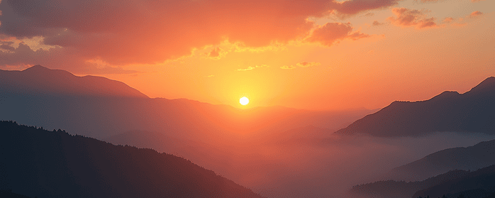 A vibrant sunrise over a misty valley, symbolizing a fresh start and new opportunities.