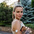 Woman with diabetes connecting her smartphone to continuous glucose monitor sensor before exercising