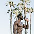 Muscular man drinking a protein shake