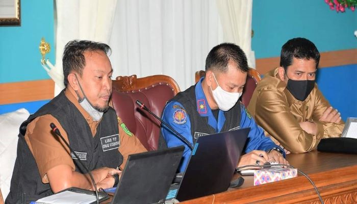 Tim gugus tugas saat mengikuti rakor