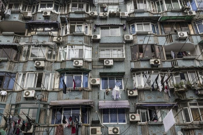 outside wall filled with air conditioners