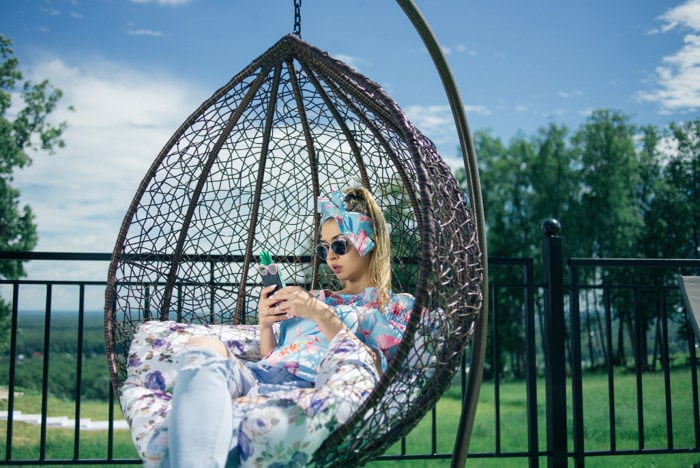 Hanging egg chairs are a great way to relax in your own backyard.