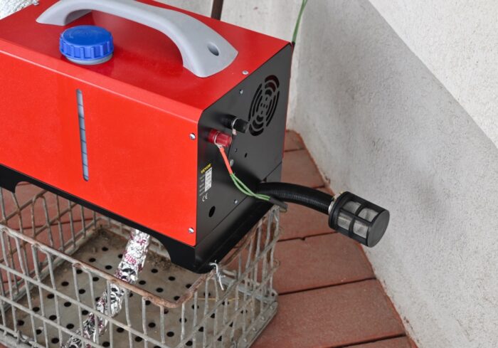 electric wires and air filter on a portable diesel heater being used for emergency home heating