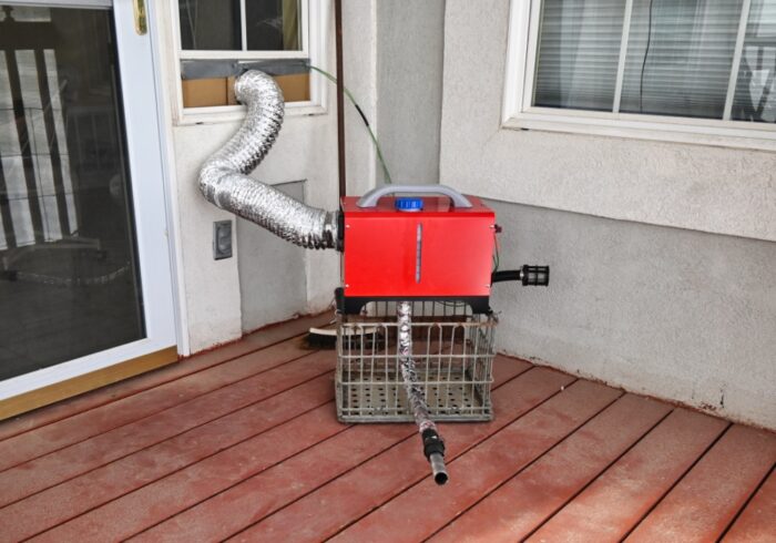 vevor portable diesel heater being used for emergency home heating