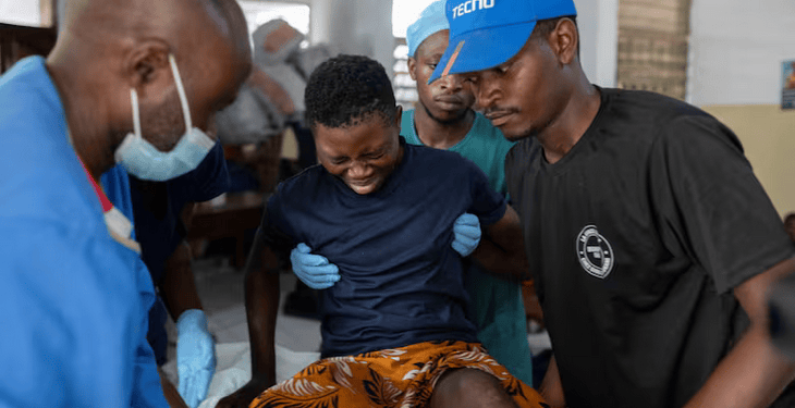 Health workers bring a patient for surgery at a hospital, in eastern Democratic Republic of the Congo, on Saturday. (Arlette Bashizi/Reuters)