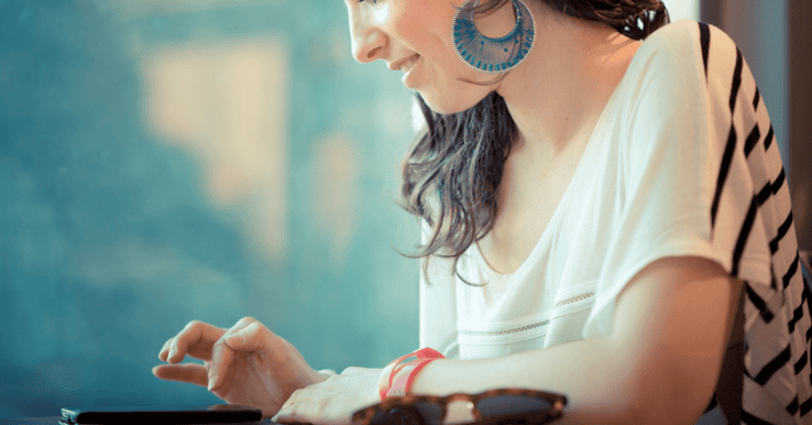 woman scrolls on instagram on phone