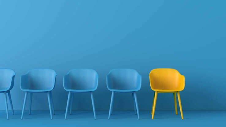 chairs with one in yellow stands out