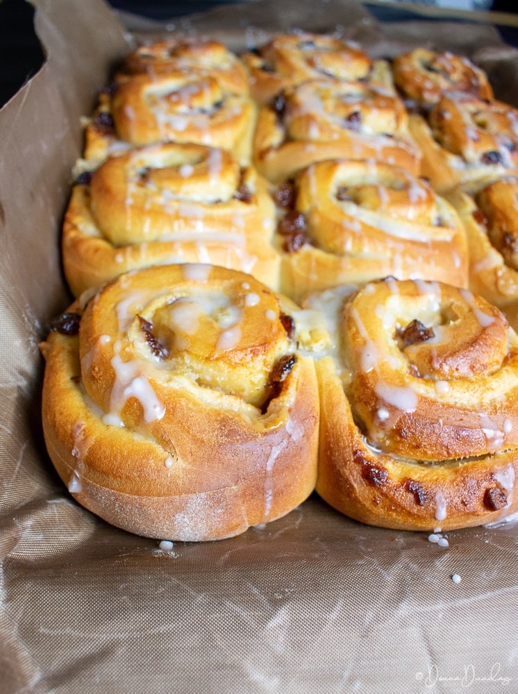 mincemeat buns on baking paper in tray