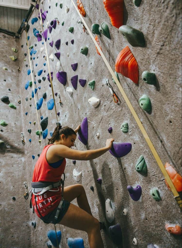 A climber on an auto belay route