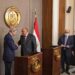 Egypt’s Foreign Minister Sameh Shoukri and the United States climate envoy John Kerry (L) hold a joint press conference in the capital Cairo, on February 21, 2022. (AFP)
