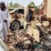 A man inspects damage as he walks through the rubble by a destroyed car outside a house that was hit by an artillery shell in the Azhari district in the south of Khartoum on June 6, 2023. The United States and Saudi Arabia on June 4 made a renewed push for truce talks between Sudan's warring generals as deadly fighting has raged into its eighth week. Multiple ceasefires have been agreed and broken, and Washington slapped sanctions on the two warring generals last week, blaming both sides for the "appalling" bloodshed. (Photo by AFP) (Photo by -/AFP via Getty Images)