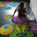 Above, a medical staff makes a rangoli designs at an anti-retroviral therapy center which provides care and support to people with HIV/AIDS at the government-run Gandhi Hospital in Hyderabad on Dec. 1, 2023, on the occasion of World AIDS Day. (AFP)