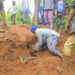 In this handout photo released by Gofa Zone Government Communication Affairs Department, a man searches for survivors hundreds of people gather at the site of a mudslide in the Kencho Shacha Gozdi district, Gofa Zone, southern Ethiopia, Monday, July 22, 2024. At least 146 people were killed in mudslides in a remote part of Ethiopia that has been hit with heavy rainfall, according to local authorities. (Gofa Zone Government Communication Affairs Department via AP)