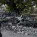 A boy runs past cars destroyed in a recent Israeli strike on August 24, 2024 Mays Al-Jabal, Lebanon.
Chris Mcgrath | Getty Images News | Getty Images