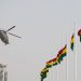A similar Ghana military helicopter to the one that crashed flies over Accra in 2020. Credit: NIPAH DENNIS/AFP via Getty Stock Images