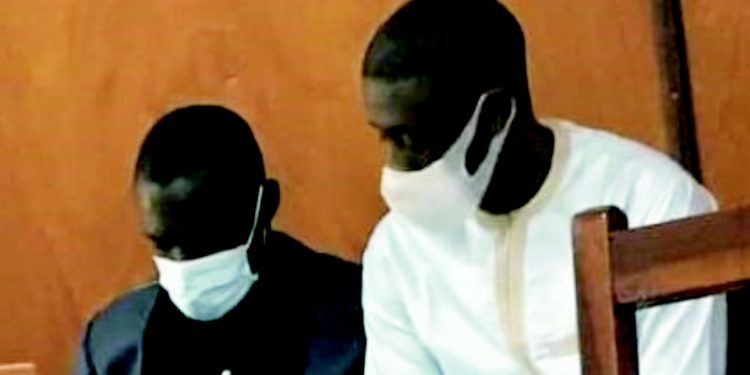 Saihou Drammeh, former Managing Director and Lamin Gassama, former Operations Manager at the Gambia Petroleum Storage depot in Lamin Mandinary sitting the High Court in Banjul