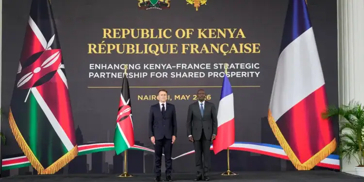 French President Emmanuel Macron, left, and Kenyan President William Ruto shake hands at State House in Nairobi, Kenya, Sunday, May 10, 2026. (AP Photo/Brian Inganga)