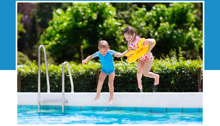 two children, one child with a floatation ring jumping in a swimming pool