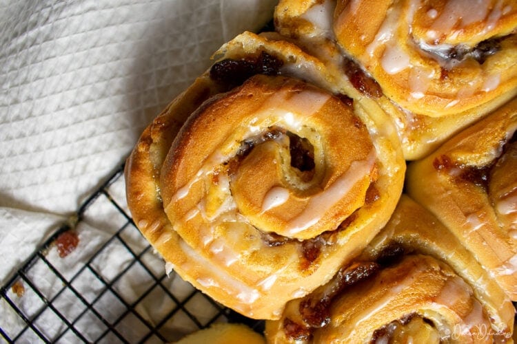 Top view, close up of mince pie cinnamon roll on wire rack