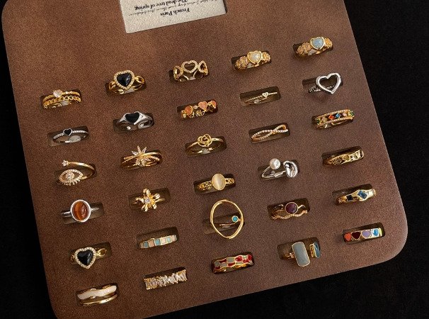 Side-by-side metal samples for jewelry wholesale — stainless, copper, alloy