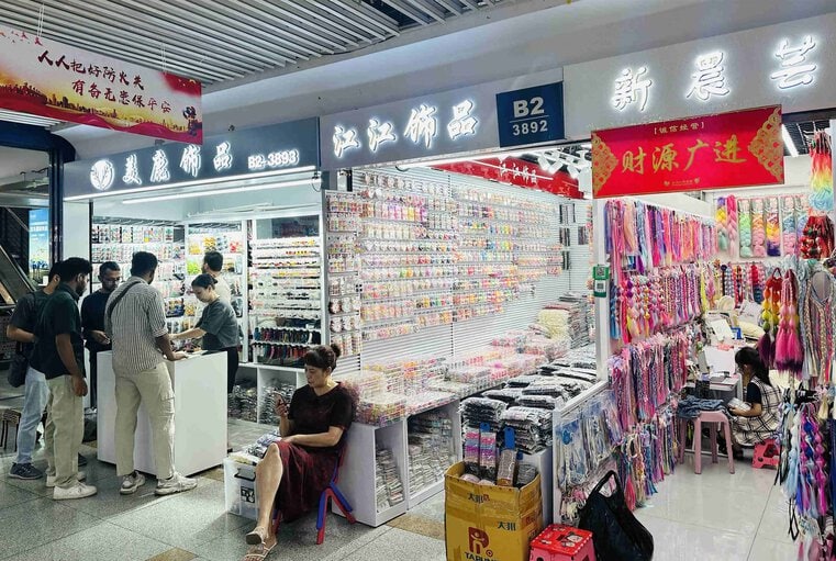 Stocked shelves of wholesale jewelry on display inside the Yiwu market complex