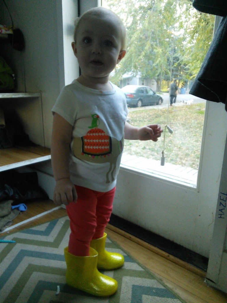 He costume would have been AWESOME if her boots would have come in time, now shes just got awesome rain boots