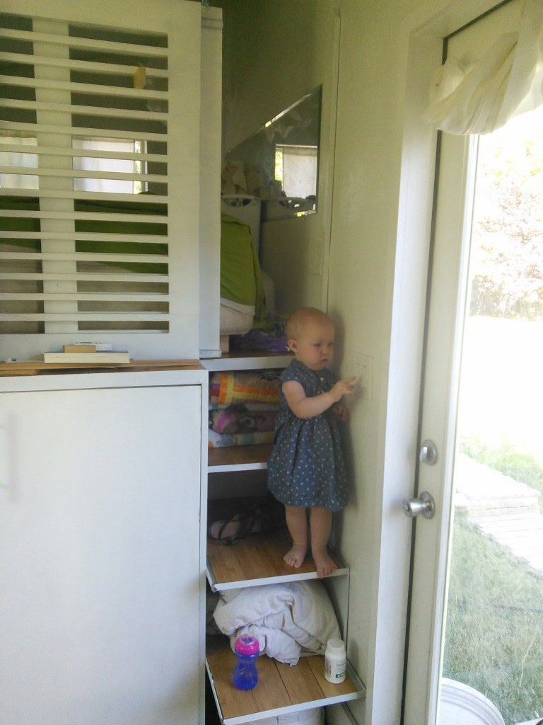 Hazel figuring out the light and fan on the new bamboo steps.