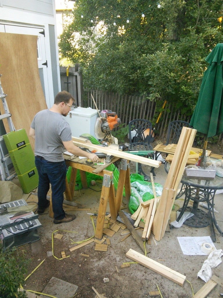 Starting to frame up the beds, James insisted on helping even though it was the fun part that I like (can you see my new chop saw?  It was my mothers day present :))