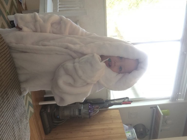 and wearing her moms robe