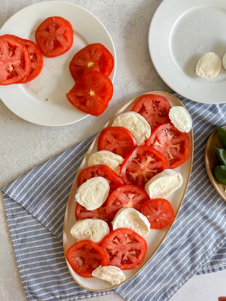Assembling Tomato and Mozzarella slices