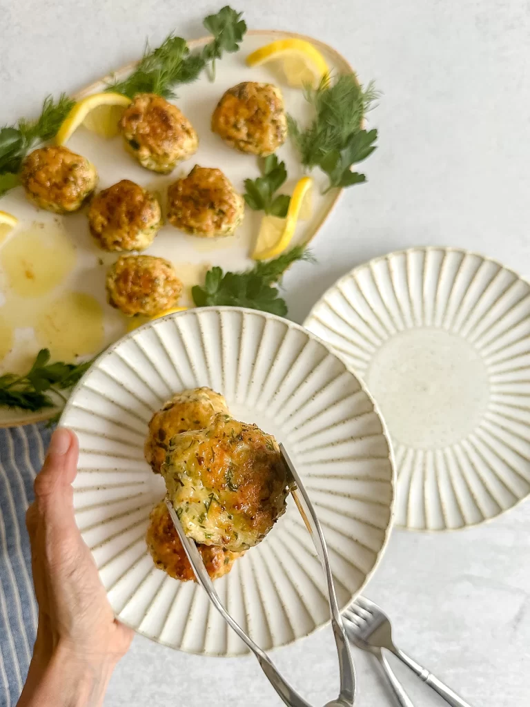 Serving ground chicken balls on a plate