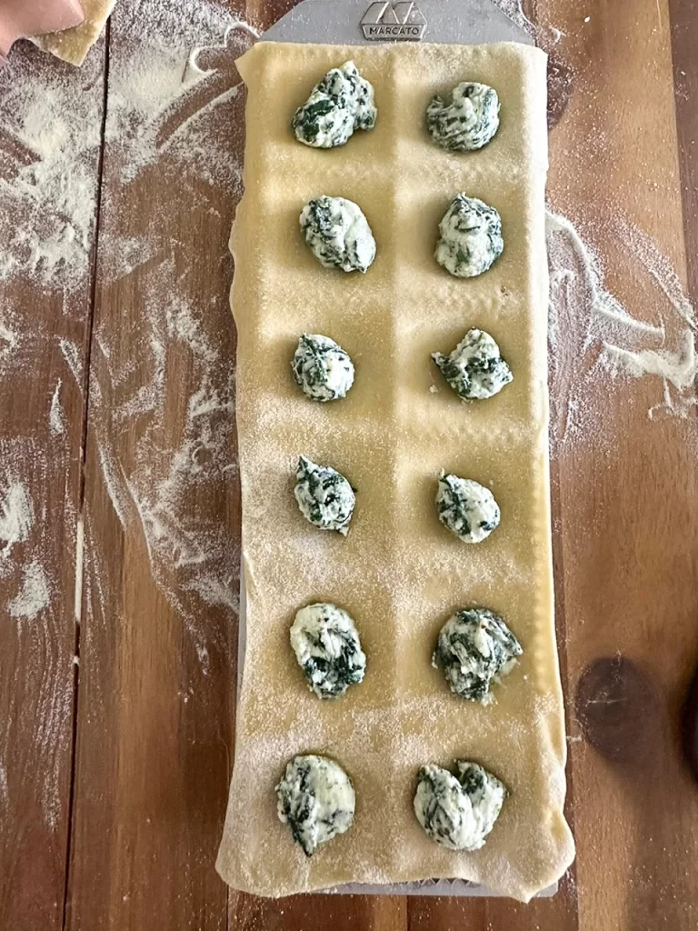 all holes of ravioli mold have been filled