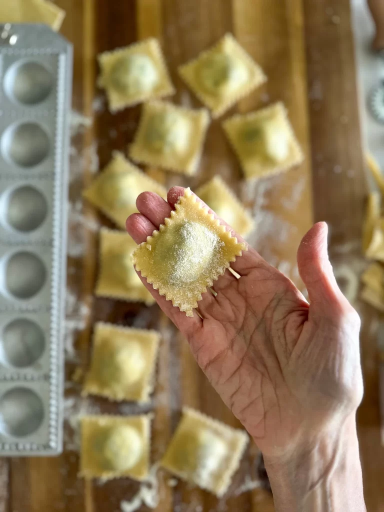 Spinach Ricotta Ravioli made in a mold.
