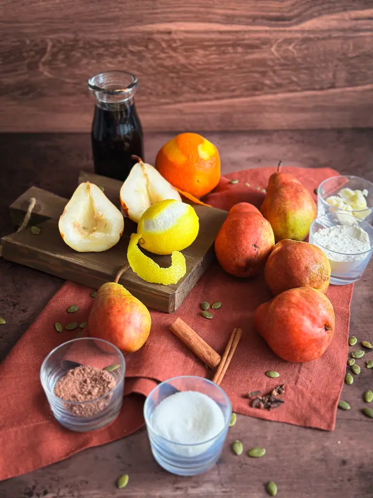 Ingredients to make raw wine poached pears and their chocolate pumpkin crumble