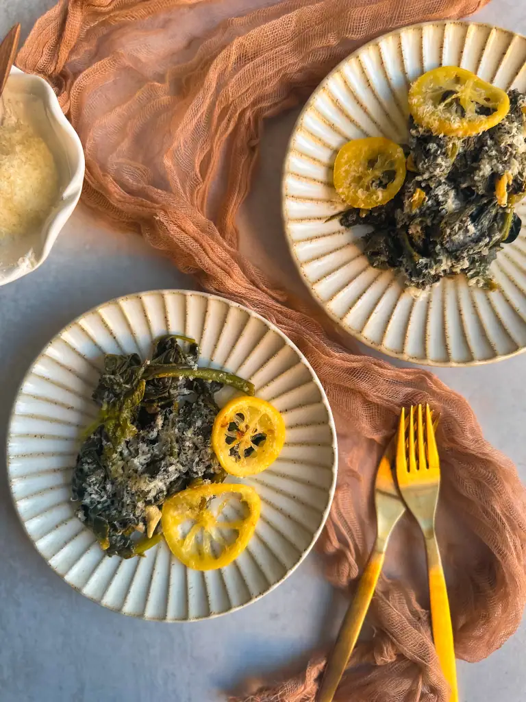 Plates with a portion of spinach